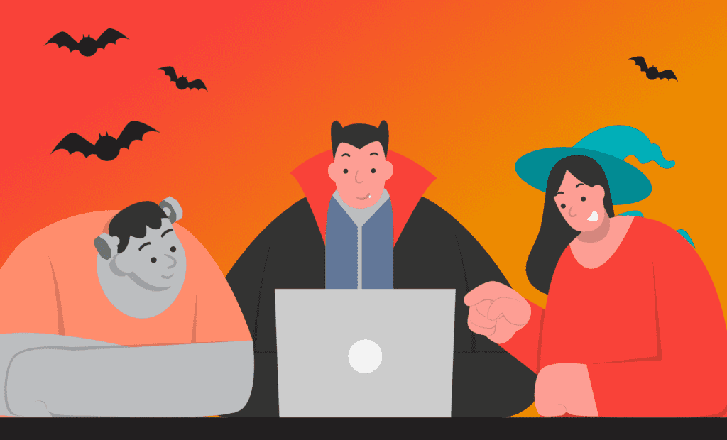 vampire, witch and monster looking at a computer